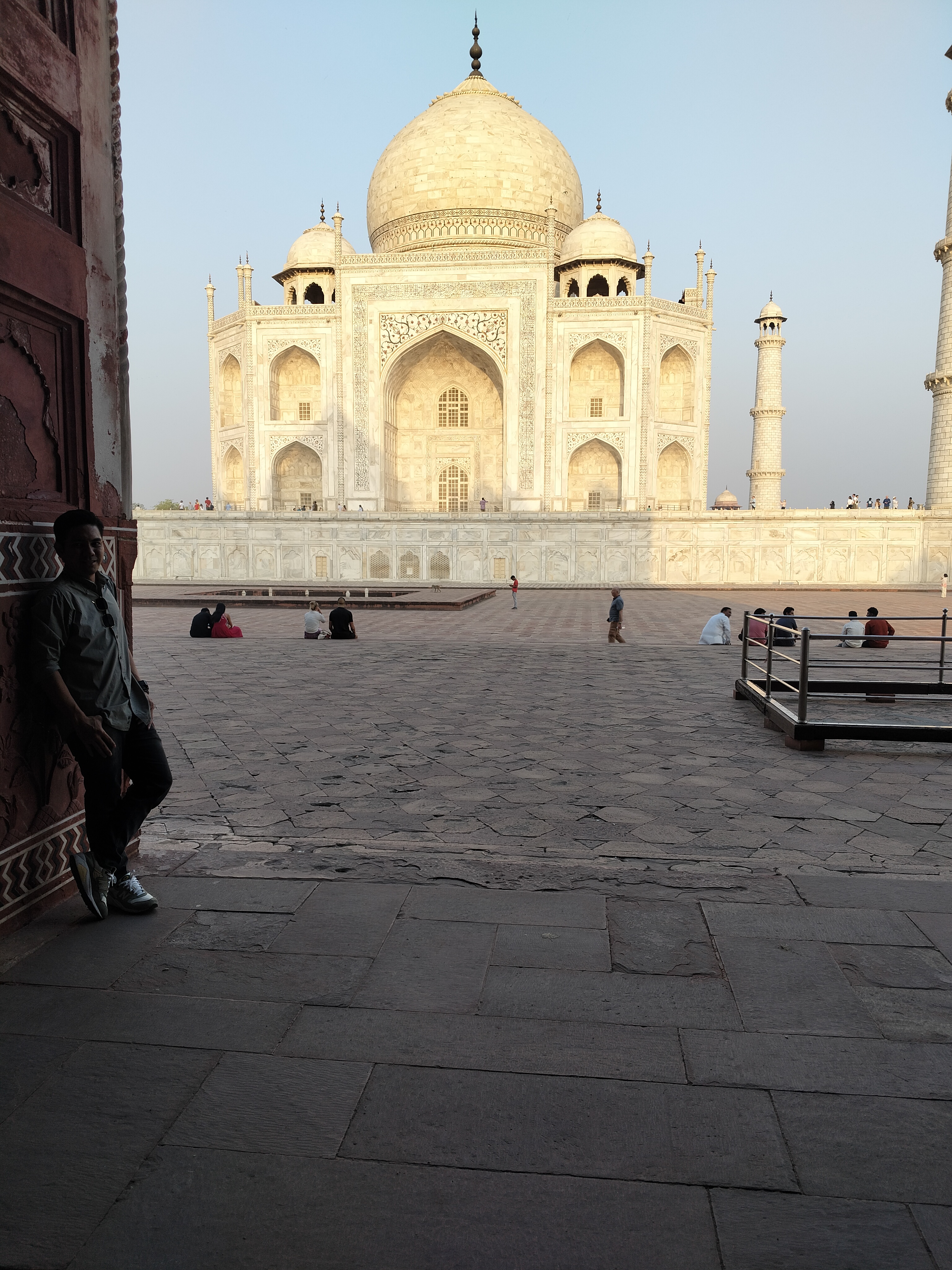 Mr. Verma with tourists smiling
